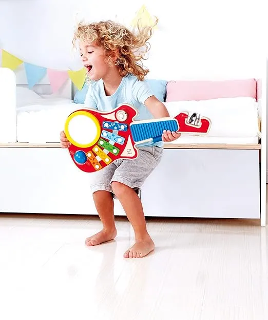 Hape 6-in-1 Music Maker | Colorful 6 Instrument Guitar Shaped Musical Toy for Ages 18 Months+